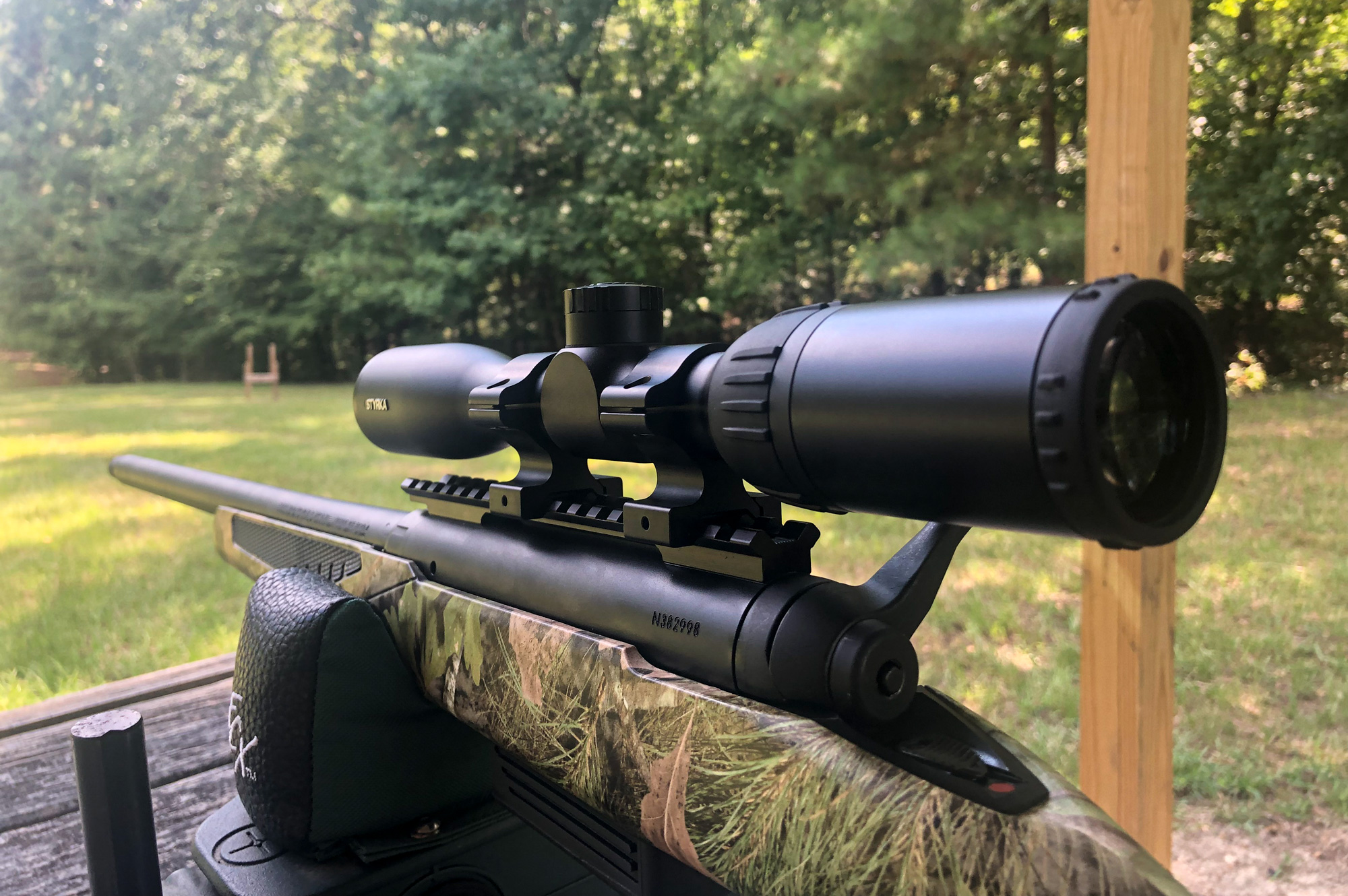 savage bolt action shotgun with a scope