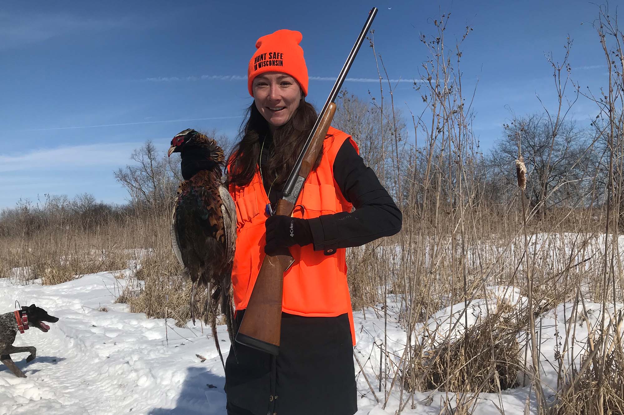 girl holding pheasant