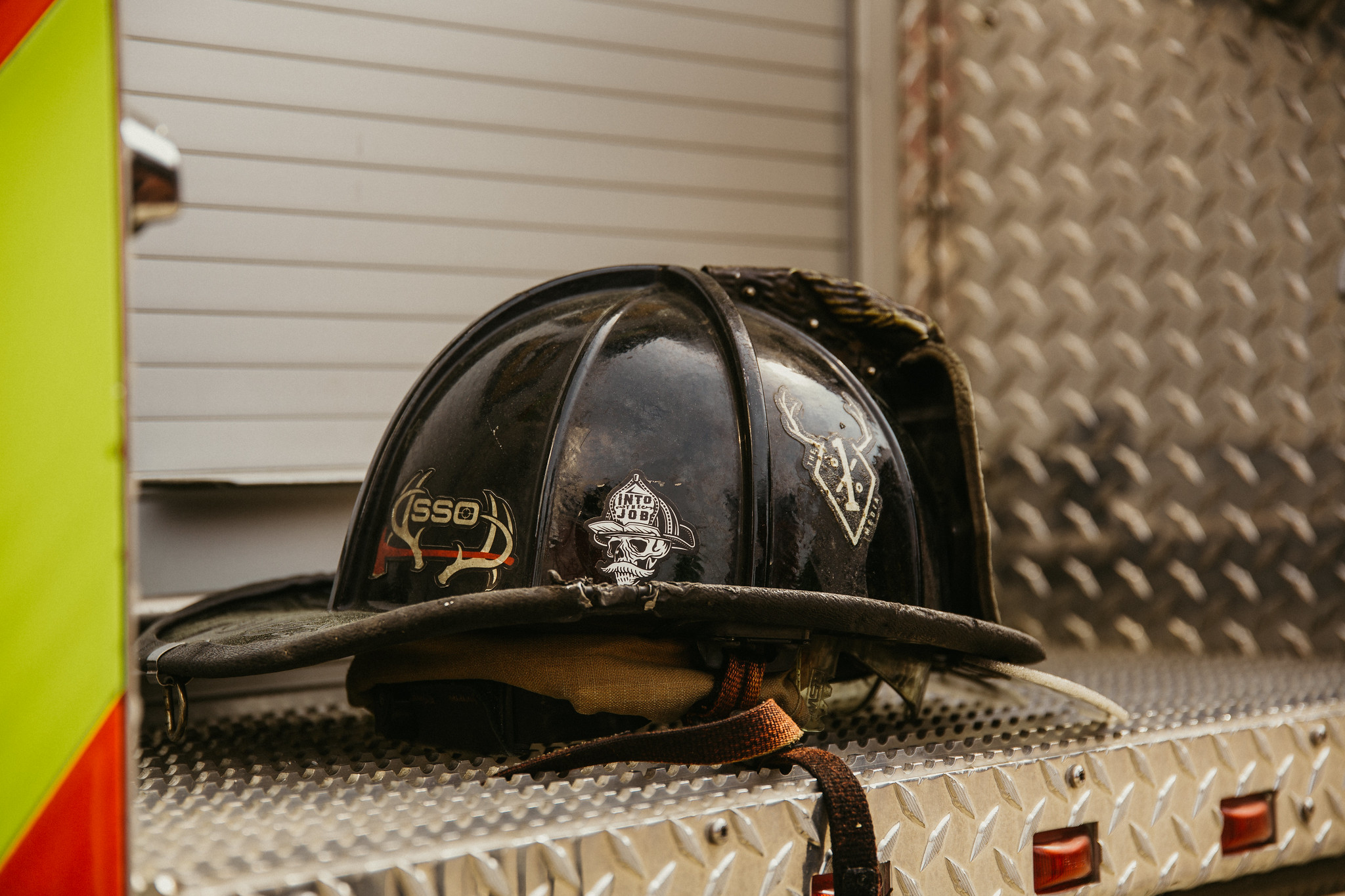 fireman helmet on a firetruck tailgate