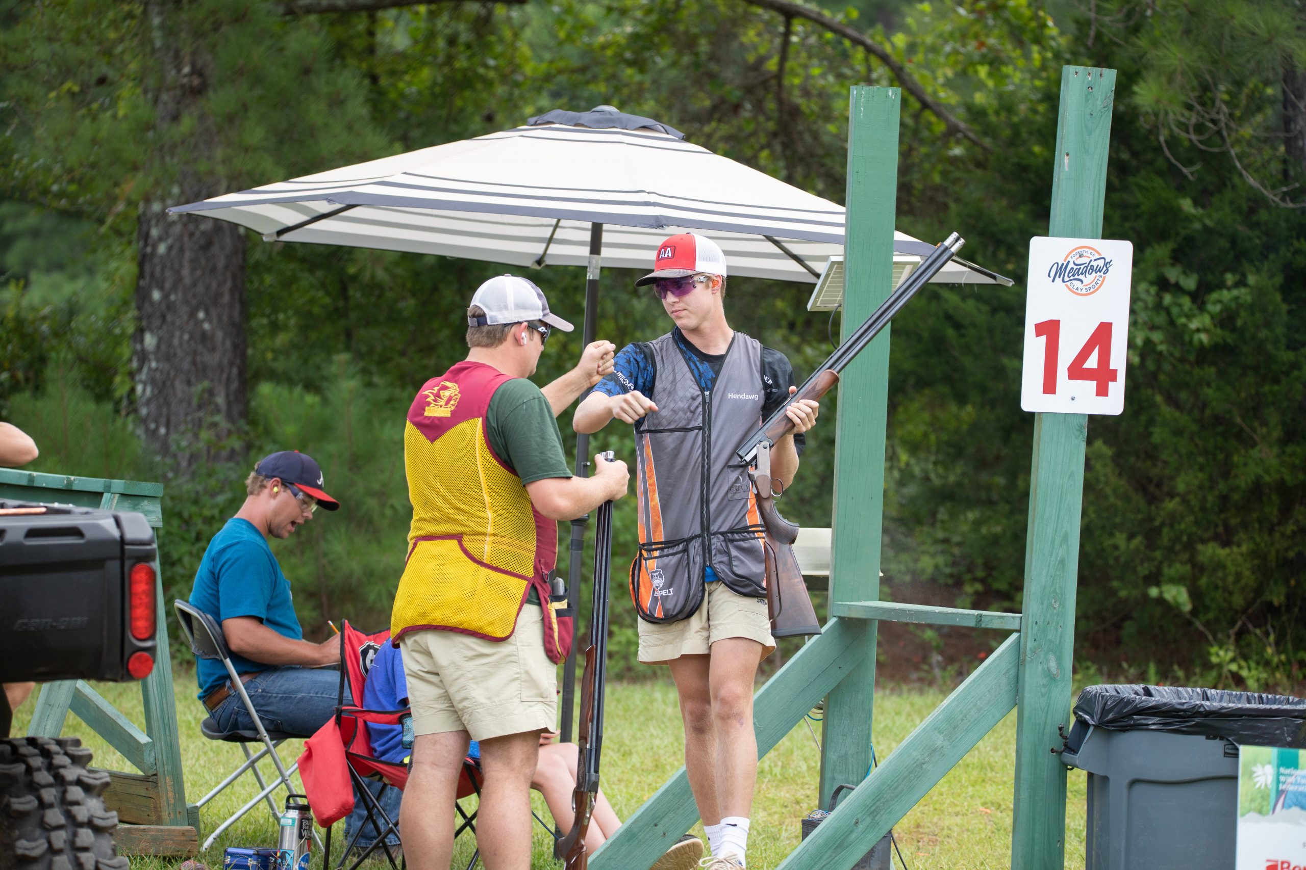 Sport shooters cheer each other on