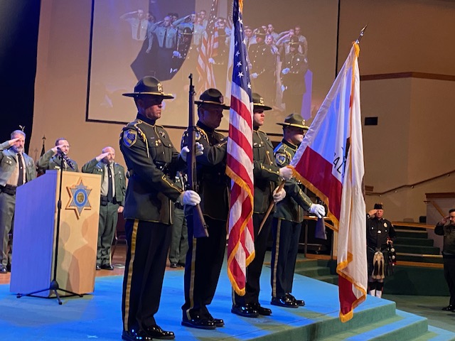 Presenting the colors during the graduation of the 2025 game wardens