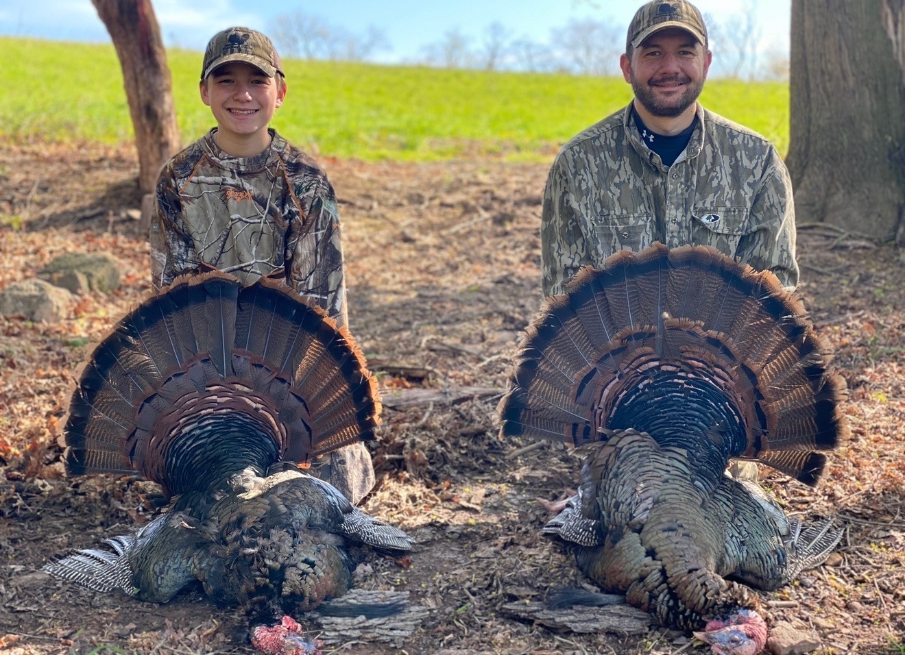 terefenko and his son with harvested turkeys